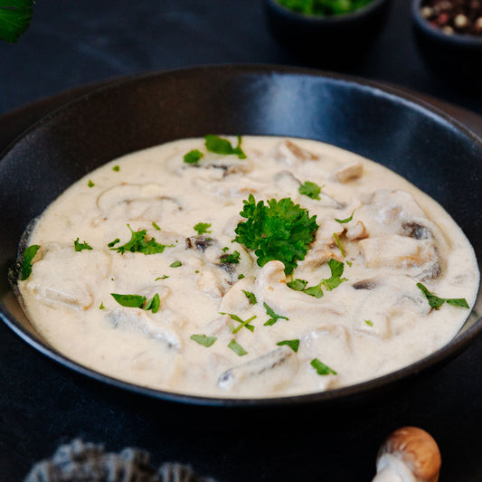 Feine Champignons in Sahnesauce mit Reis
